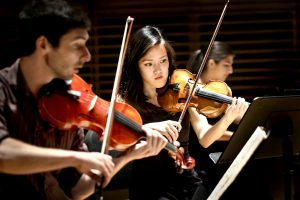 Young student artists performing at Studzinski Recital Hall