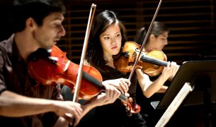 Young student artists performing at Studzinski Recital Hall